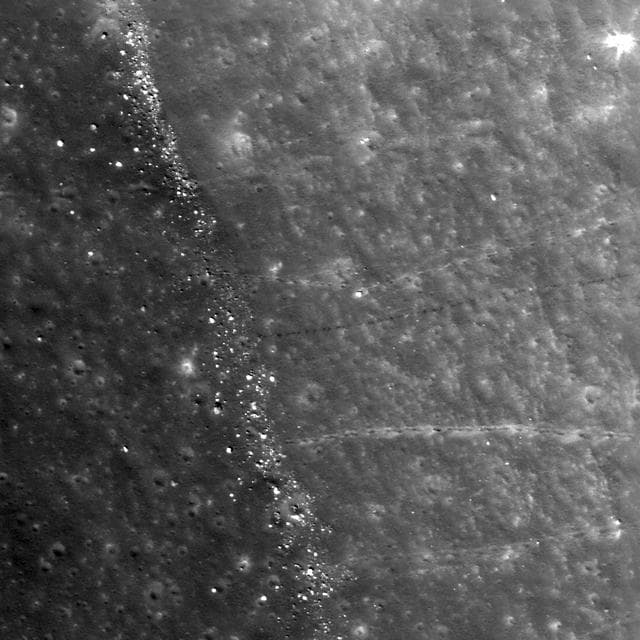 NASA image: Boulder Trails in Menelaus Crater