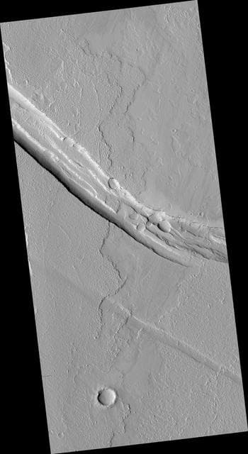 NASA image: Graben Cutting Lava Flow in Tharsis