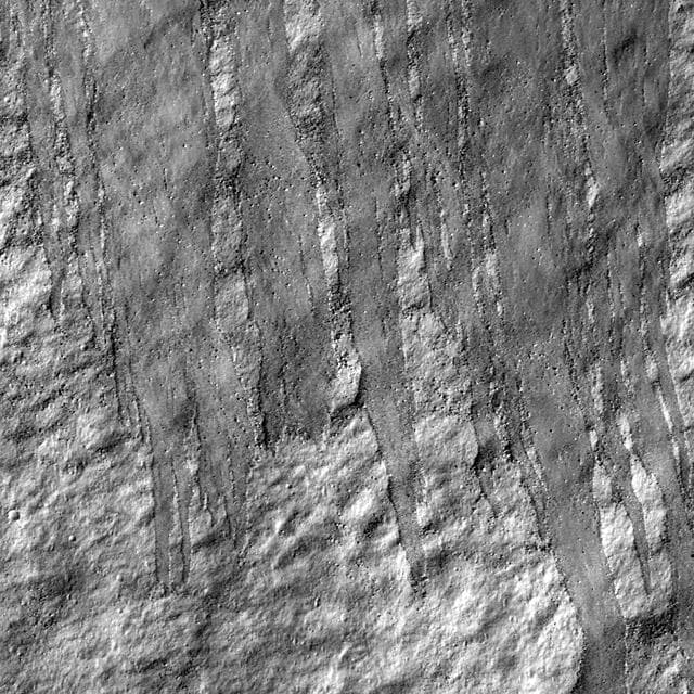 NASA image: Rock Avalanche in Robinson Crater