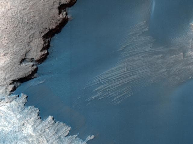 NASA image: Thumbprint Texture on Dark Dunes in Rabe Crater