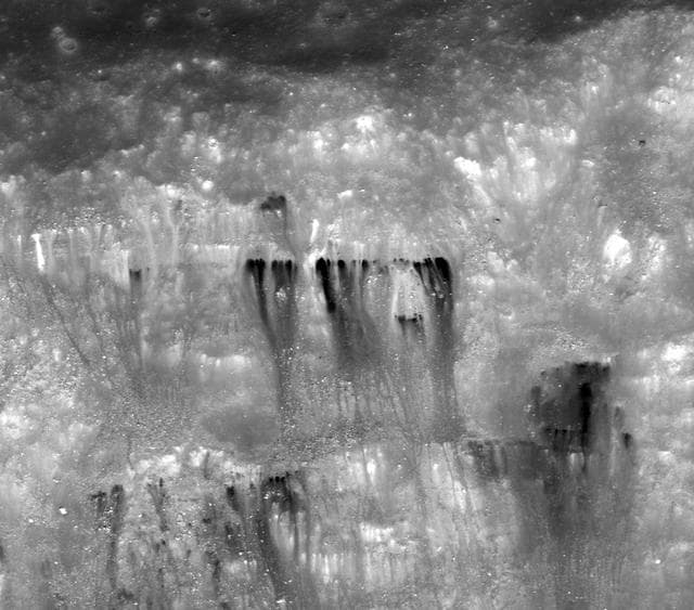 NASA image: Dark Streaks in Diophantus Crater