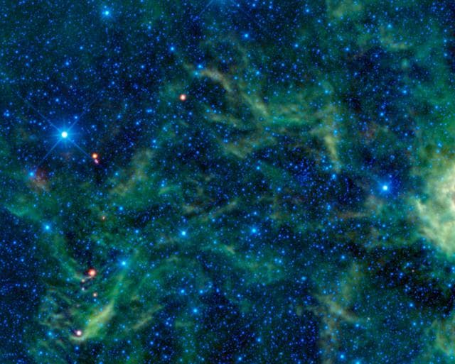 NASA image: Star Cluster Overshadowed by Infrared Objects