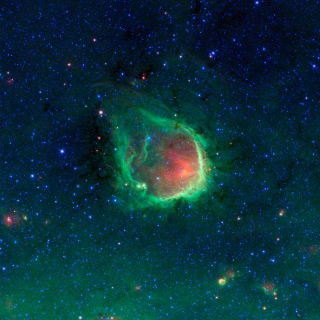 NASA image: In the Blackest Night, a Green Ring Nebula