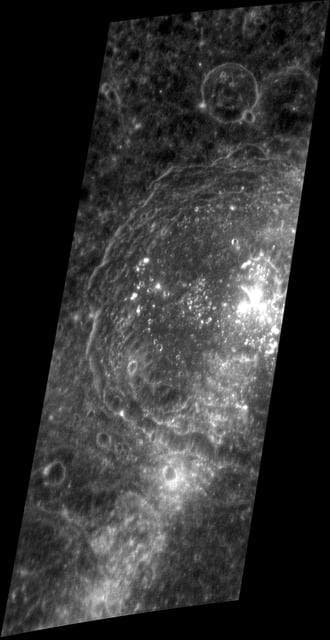 NASA image: Bright Peaks, Big Crater