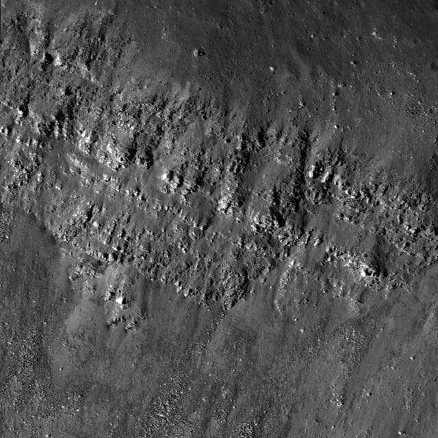 NASA image: Lava Flows Exposed in Bessel Crater