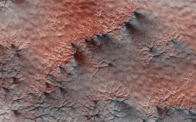 NASA image: Spiders on Mounds