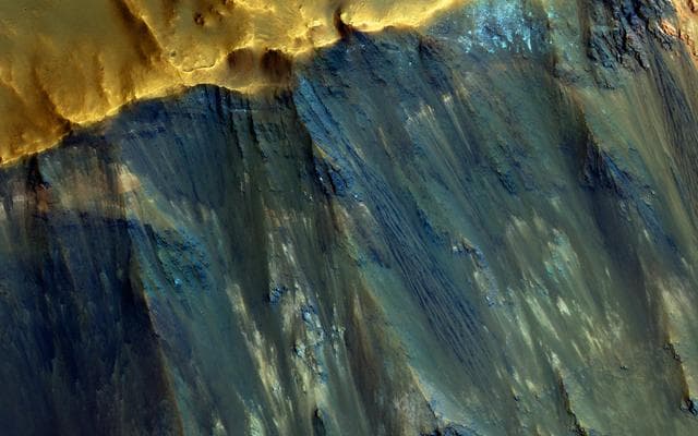 NASA image: Hues in a Crater Slope