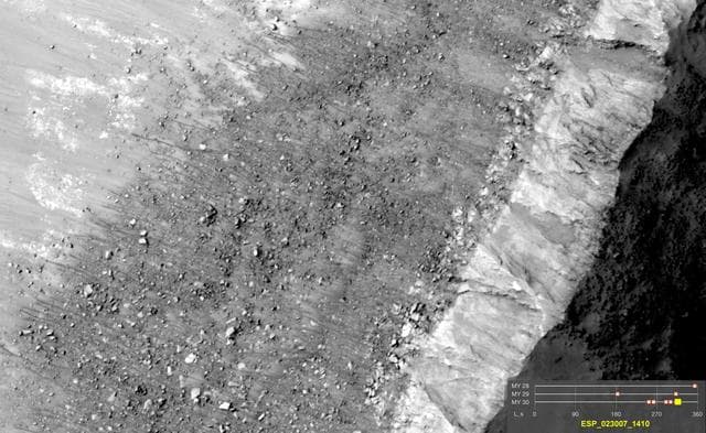 NASA image: Warm-Season Flows on Steep Slope in Slope in Terra Cimmeria Eight-Image Sequence