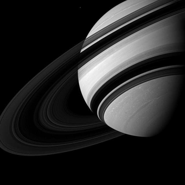 NASA image: Dwarfed by Saturn