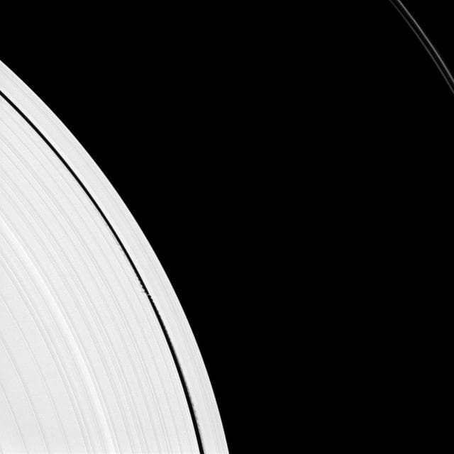 NASA image: Small Moon Makes Big Waves