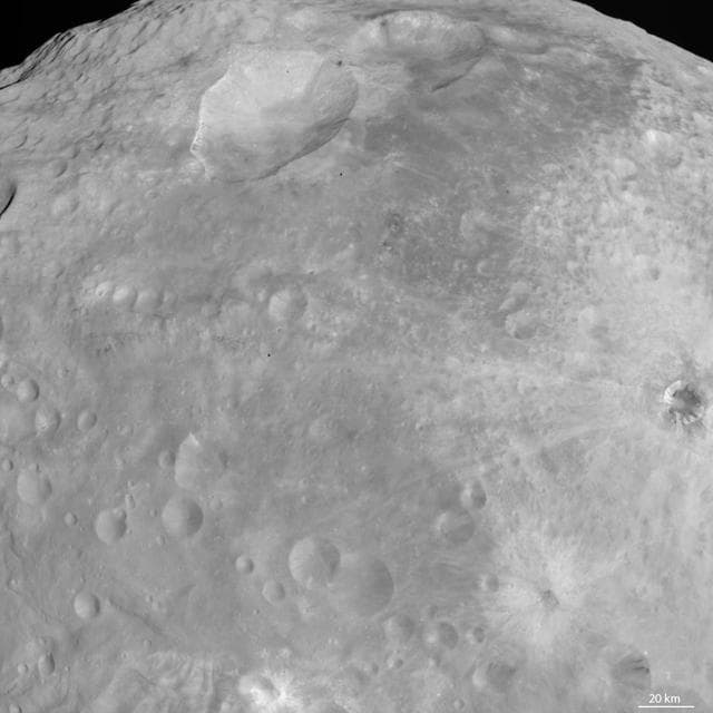 NASA image: Craters with Bright Features