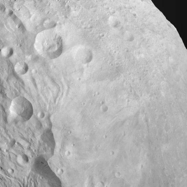 NASA image: Craters, Scarps, Troughs, Grooves and Plains on Vesta