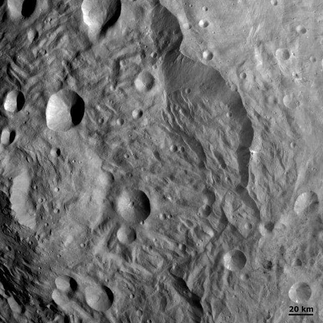 NASA image: Scarps, Hummocky Terrain and Impacts at Vesta South Pole