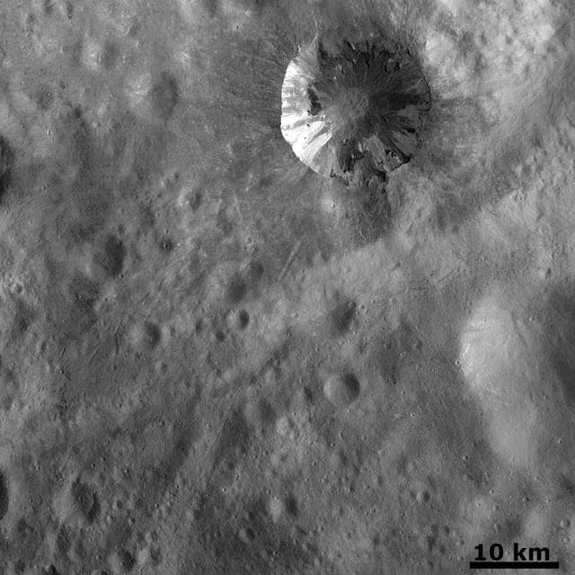 NASA image: Fresh Crater with Dark and Bright Material