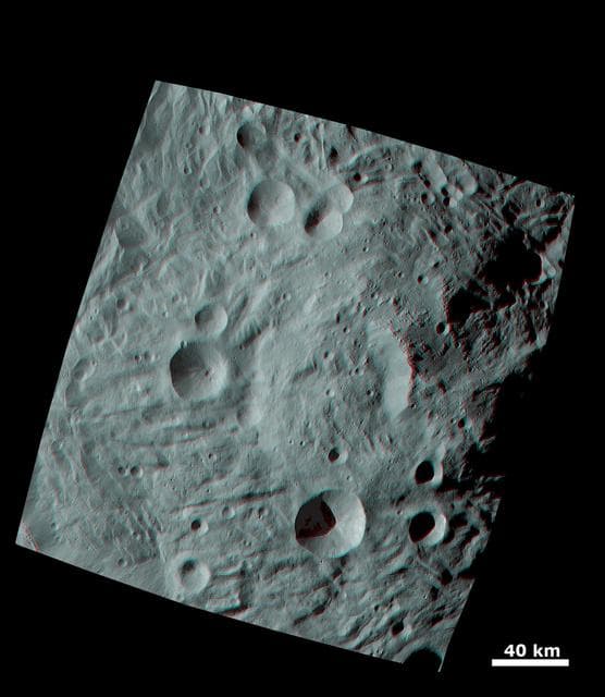 NASA image: Anaglyph Image of the Mountain-Central Complex in Vesta South Polar Region