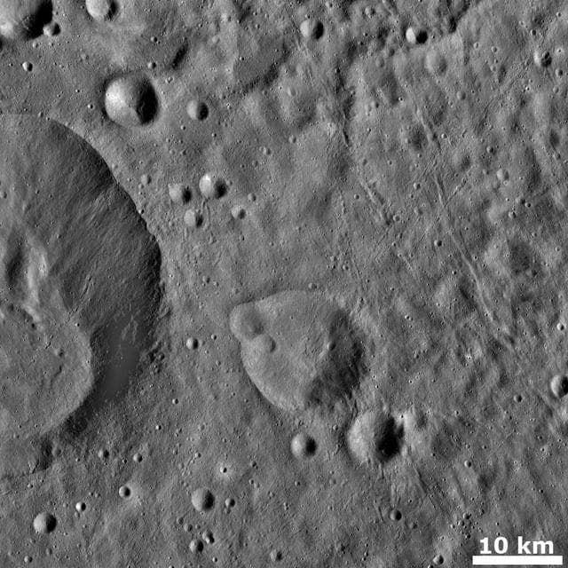 NASA image: Grooves and Crater Chains on Vesta