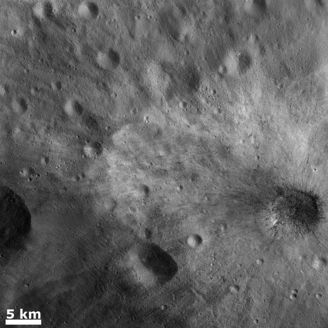 NASA image: Large Blocks of Rocky Material in a Young Ray Crater
