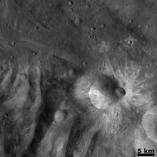 NASA image: Recent Impact on the Rim of Tuccia Crater