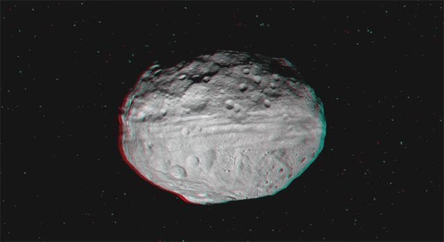 NASA image: Dawn Soars Over Asteroid Vesta in 3-D