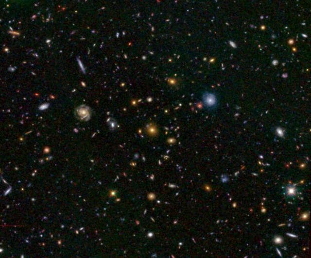 NASA image: Distant Galaxy Bursts with Stars
