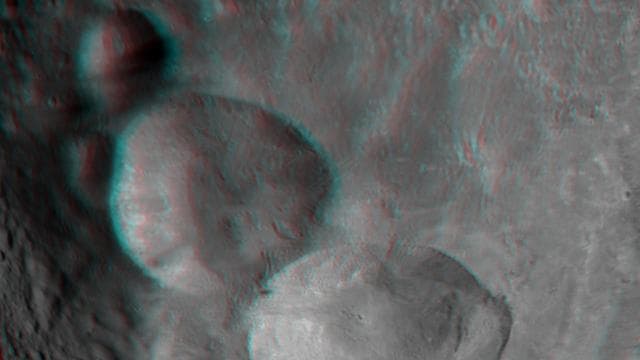 NASA image: 3-D Image of Vesta Snowman Craters