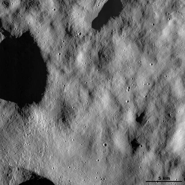 NASA image: Dust-covered Surface with Fresh Small Craters