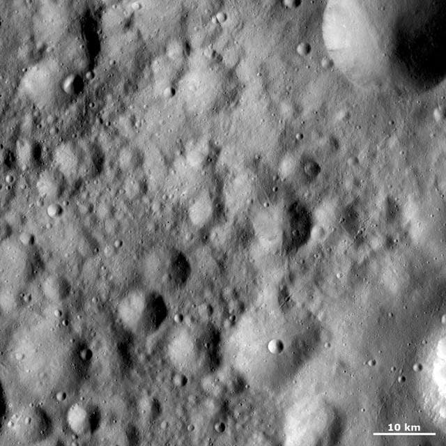 NASA image: Fresh Crater Inside a Rectangular Crater