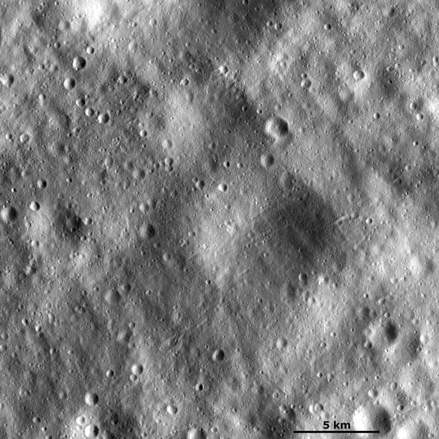 NASA image: Large Subdued and Small Fresh Craters