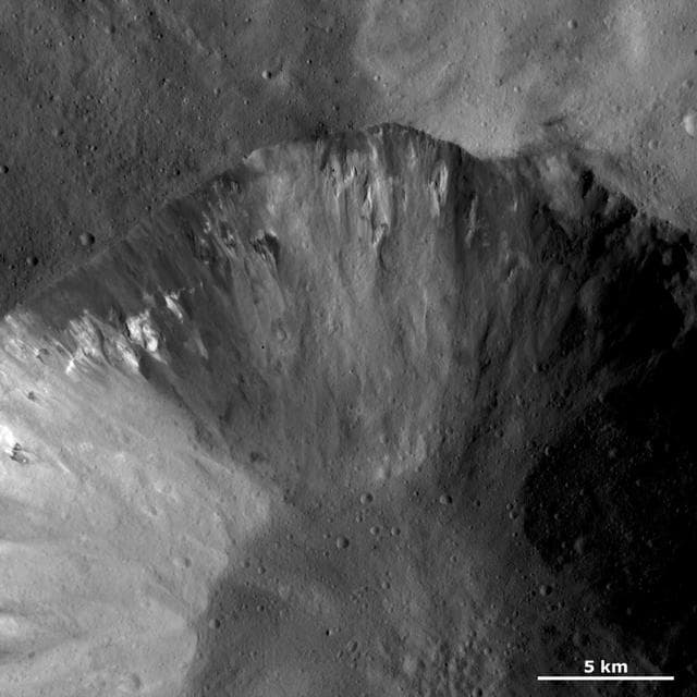 NASA image: Dark and Bright Material in a Crater Wall