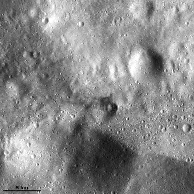 NASA image: Dark Material in the Ejecta of a Small Crater
