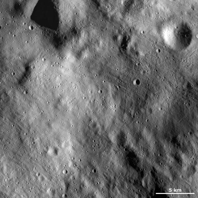 NASA image: Surface Covered by Regolith and Fresh Young Impacts