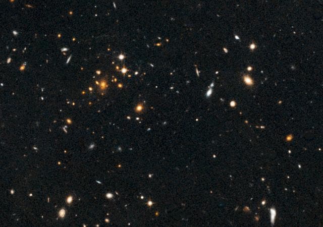 NASA image: Galaxy Cluster and Giant Arc