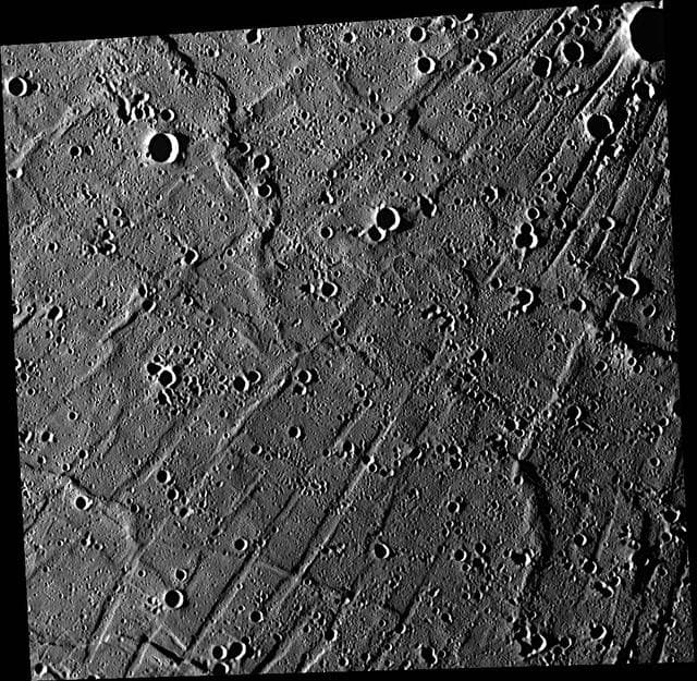 NASA image: Radiating Troughs of Pantheon Fossae