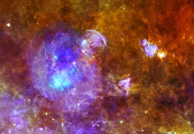 NASA image: Life and Death in a Star-Forming Cloud