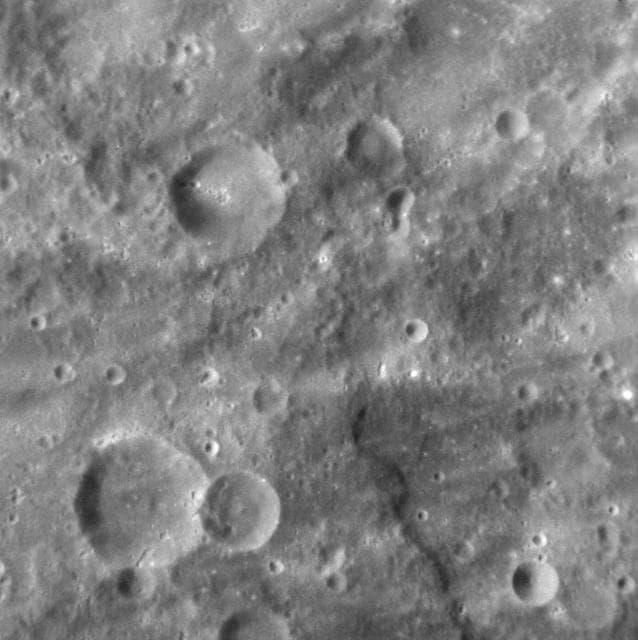 NASA image: Guessing the Number of Craters in this Image