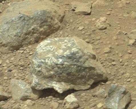 NASA image: Bluish-Black Rock with White Crystals on Mars