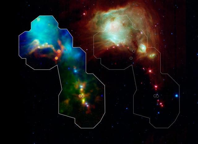 NASA image: Infant Stars Peek Out from Dusty Cradles