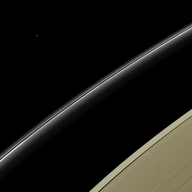 NASA image: Blue Orb on the Horizon
