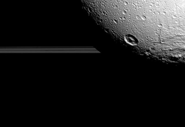 NASA image: Dione: Craters and Rings