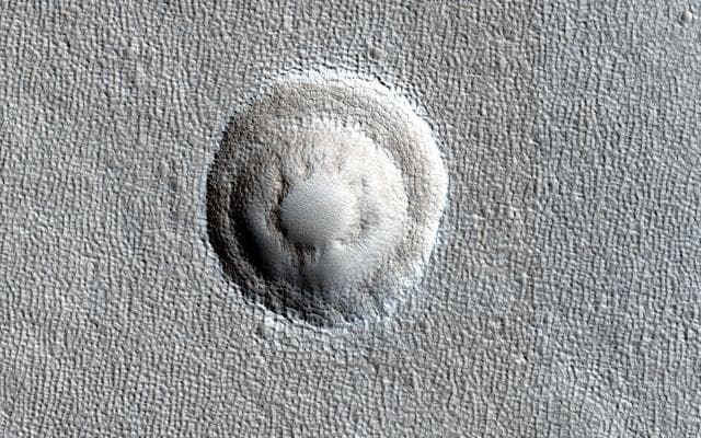 NASA image: Terraced Craters and Layered Targets