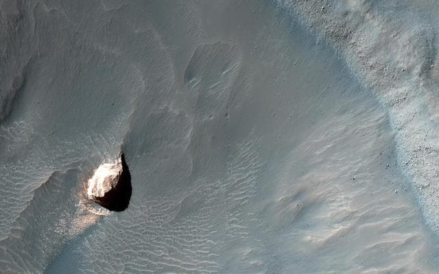 NASA image: Small Crater within Pollack Crater Containing Light-Toned Material