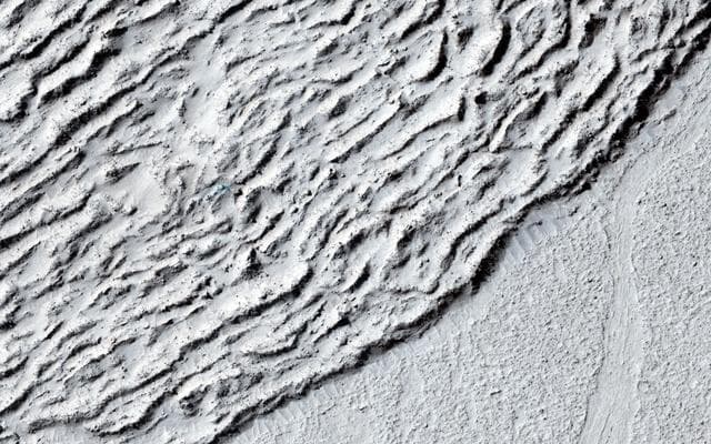 NASA image: Lava Against an Impact Crater in Elysium Planitia