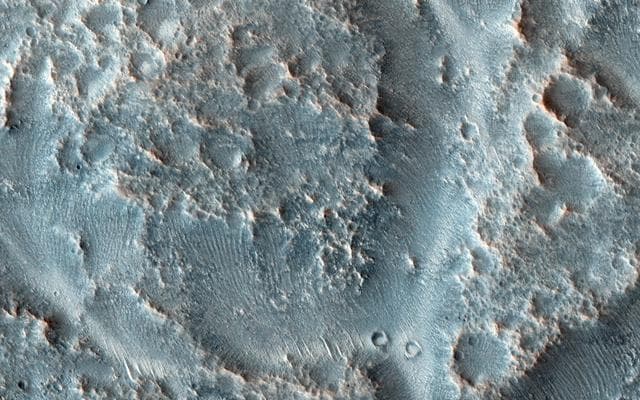NASA image: Oxbows and Cutoffs in Idaeus Fossae