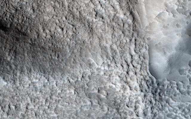 NASA image: Breached Rim of a Circular Depression
