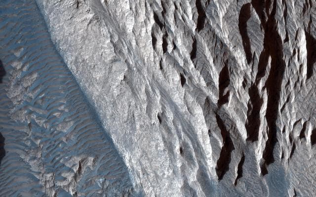NASA image: Sandstone Cliffs and Hematite Lag Deposits of Ophir Mensa