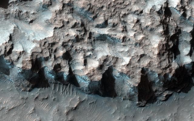 NASA image: Ice in a Chlorite-Bearing Escarpment in Northwest Hellas