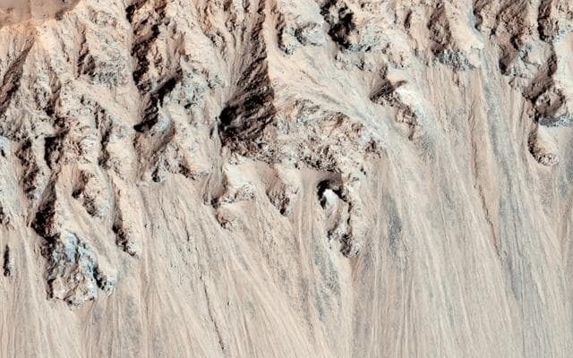 NASA image: Crater with Debris Aprons in Tyrrhena Terra