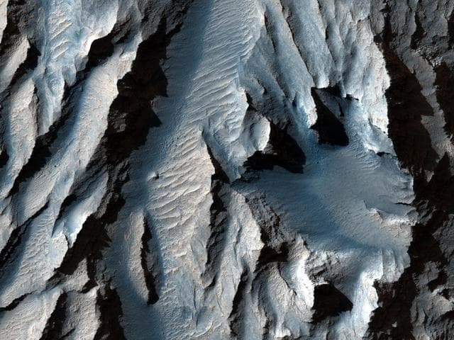 NASA image: The Obliquity of Mars Periodic Bedding in Tithonium Chasma