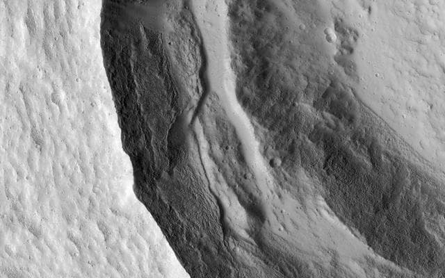 NASA image: Slumping Terraces on a Crater Wall