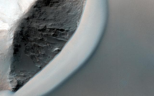 NASA image: Dunes Streaming through Hills